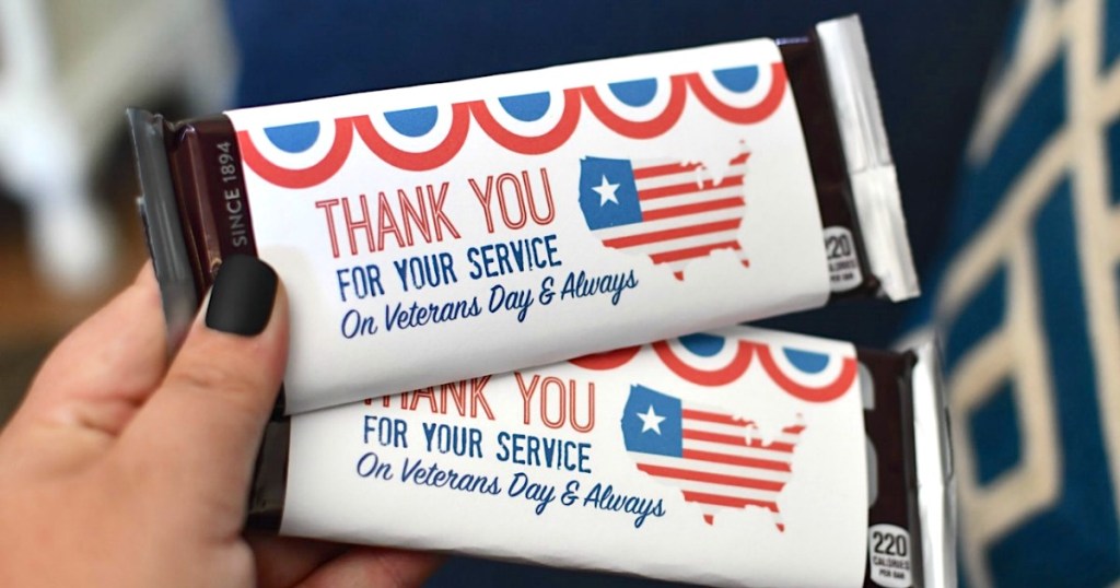 holding Veterans Day candy bars 