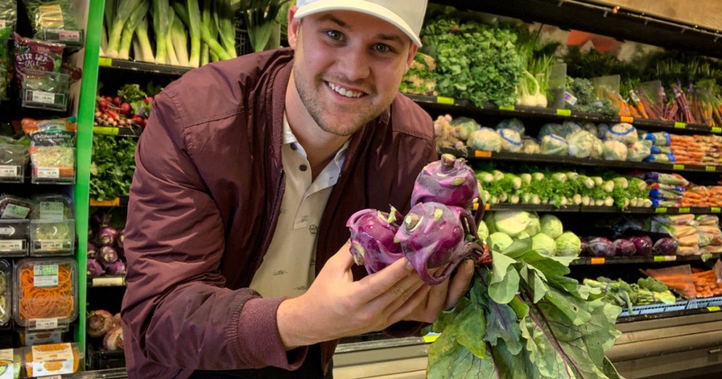 Whole foods produce with man