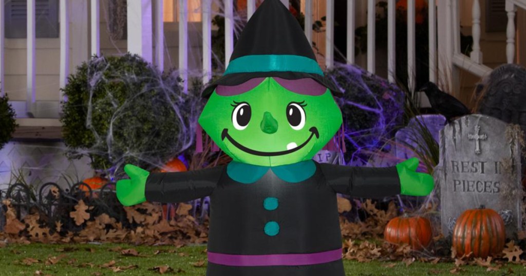 witch halloween inflatable in yard