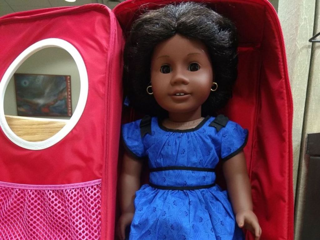 african american girl doll in pink box