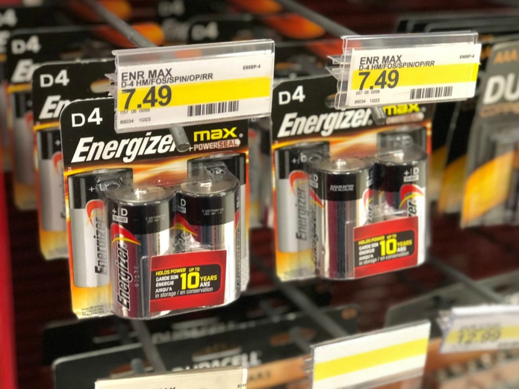 packs of batteries hanging in store display