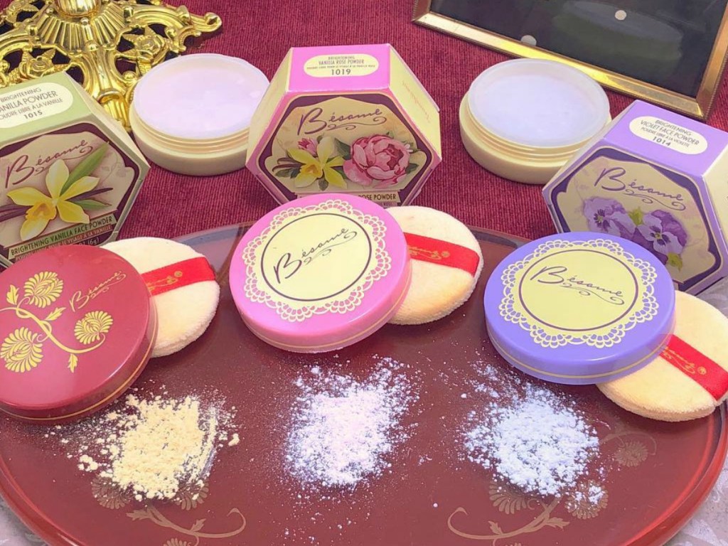 table with cosmetics with powder sitting on top