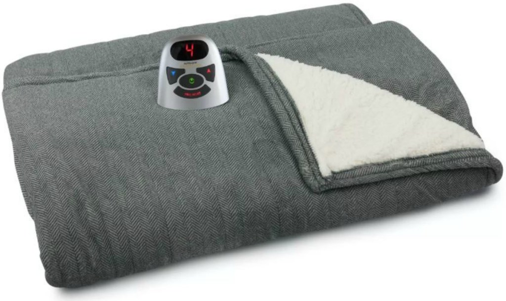 blanket with flap open and electric controller on top