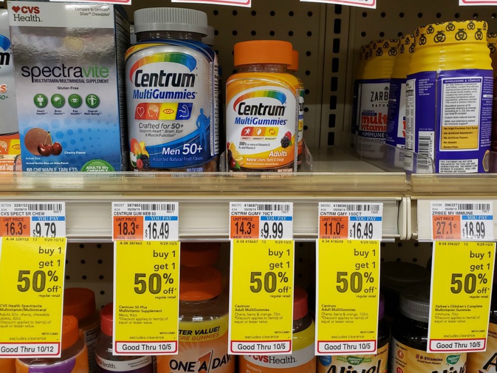 vitamins on store shelf with price tags