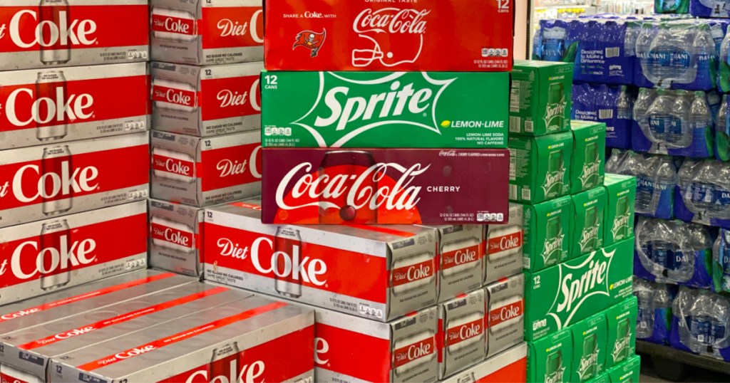 coca-cola sale with 12-packs stacked on display