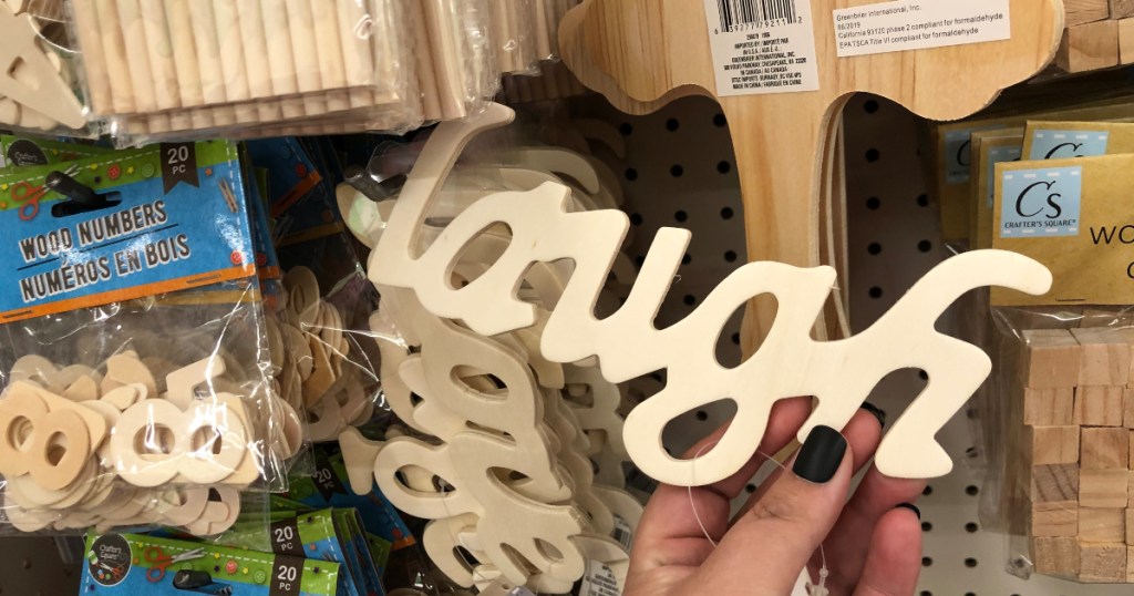 wooden craft "laugh" sign