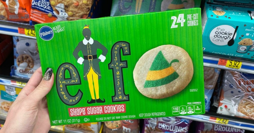woman holding a box of elf sugar cookie dough