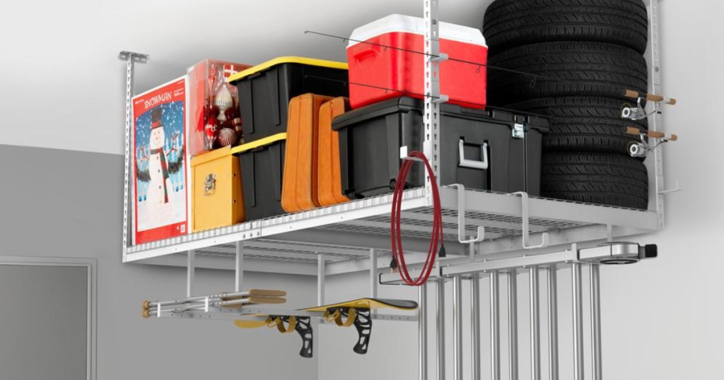 ceiling storage rack holding skis coolers and other things hanging in garage