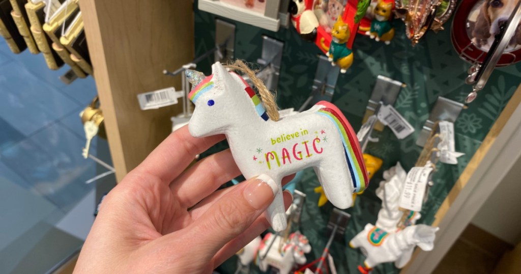 hand holding unicorn ornament