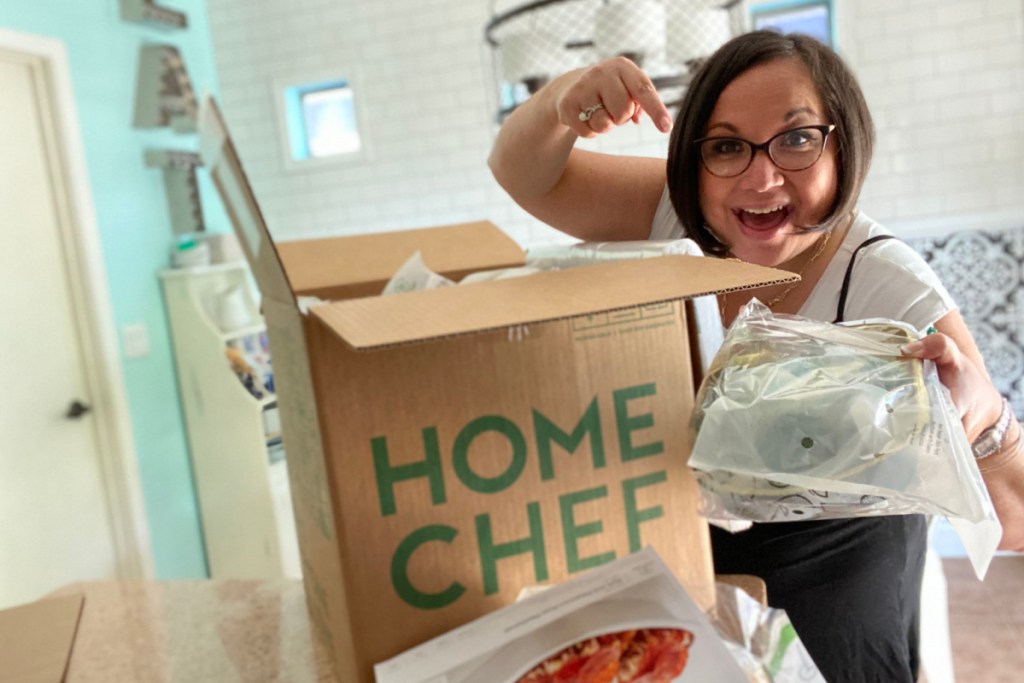 woman pointing to Home Chef ready meal