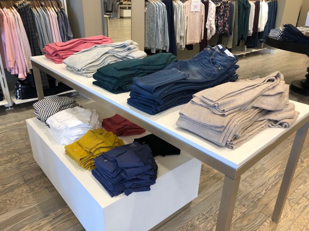 loft sweaters on display in store