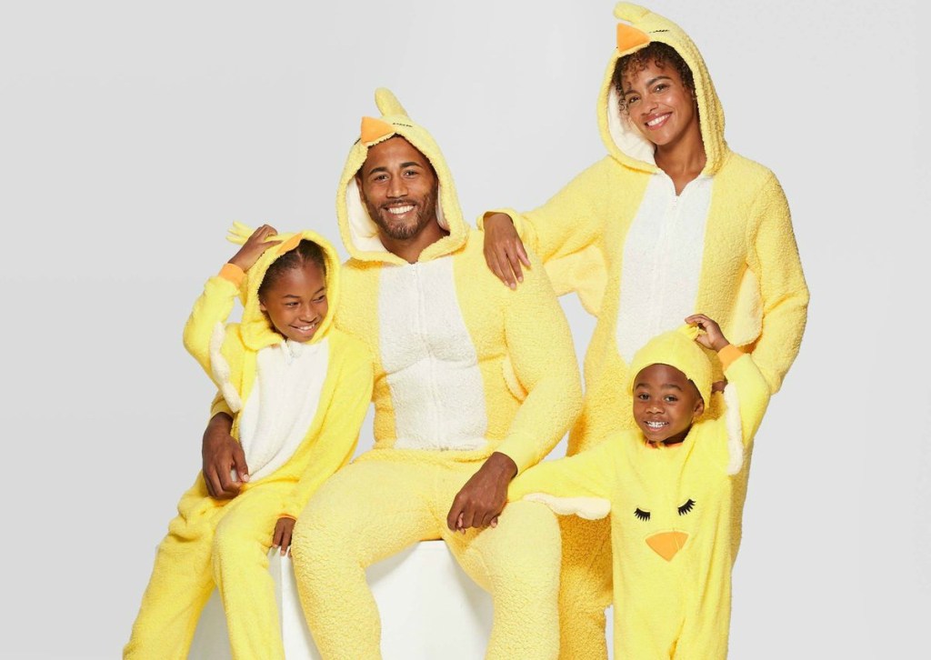 family wearing matching chicken union suits