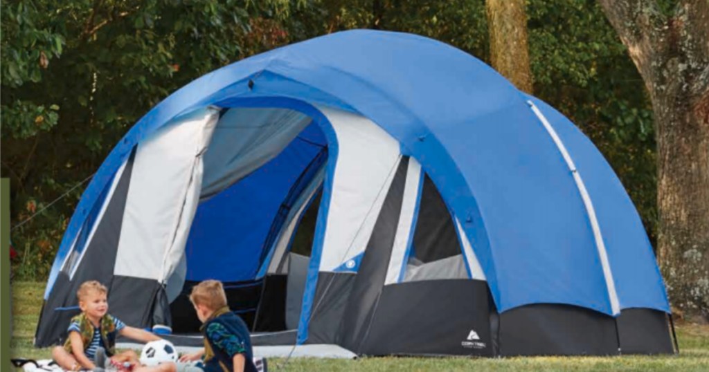ozark tent with children sitting in front of tent