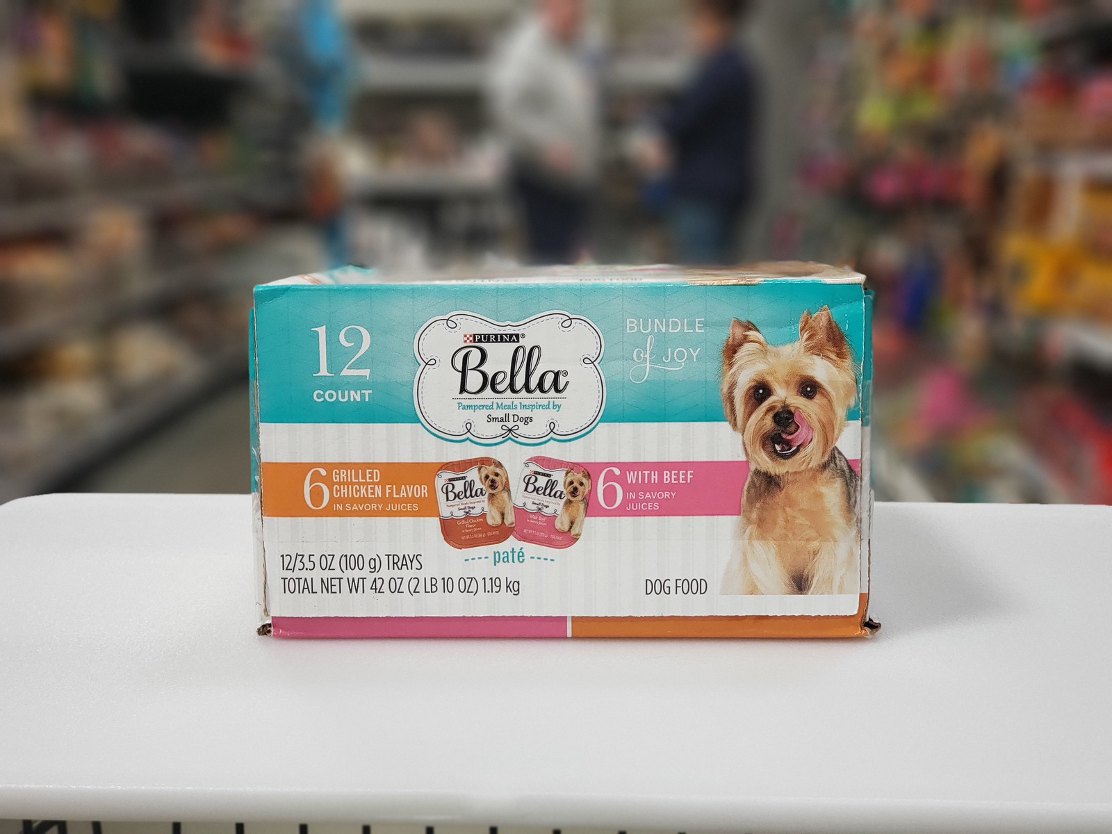 purina bella food trays on display with blurry background