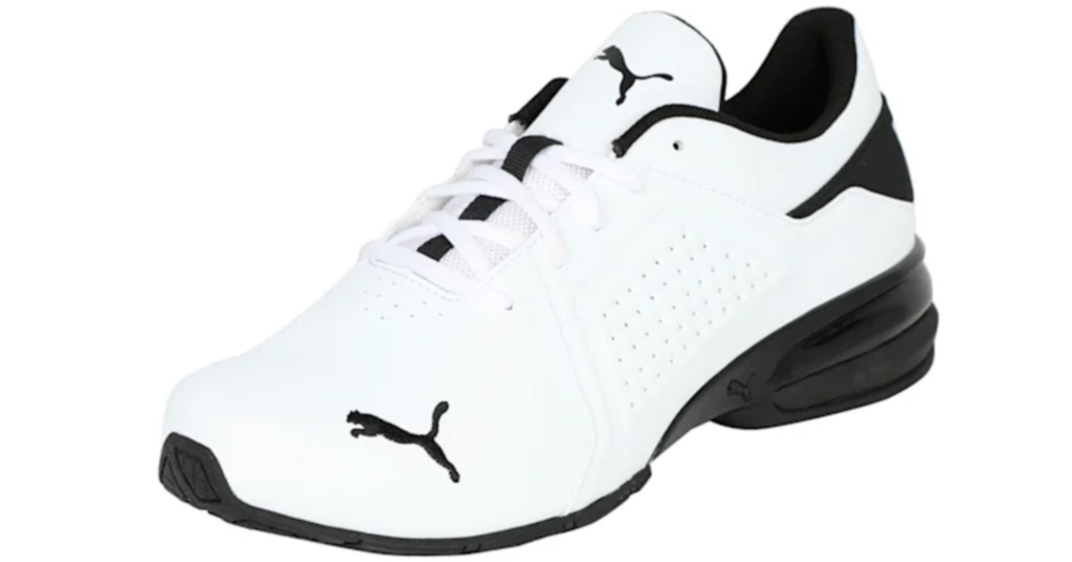 white and black puma basketball shoes with puma logo on front