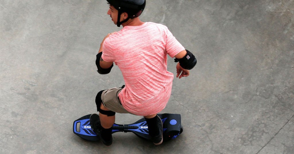 teen boy standing on ripstick toy on concrete - target christmas gifts