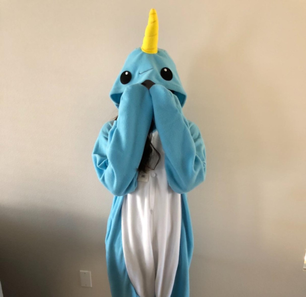 woman in narwhal costume 