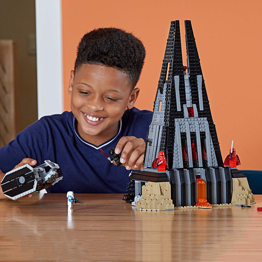 Boy playing with Darth Fortress
