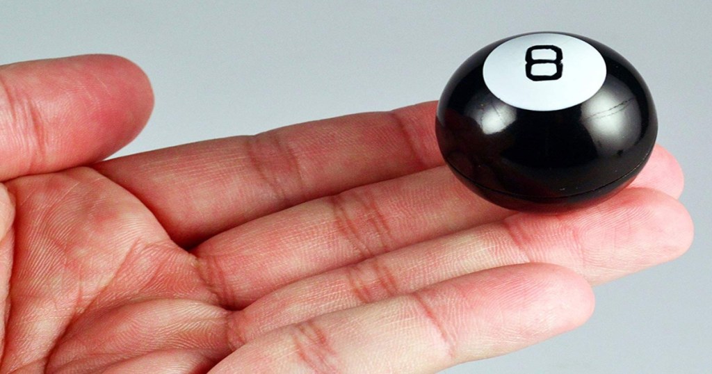 Small Magic 8 Ball resting on someone's hand