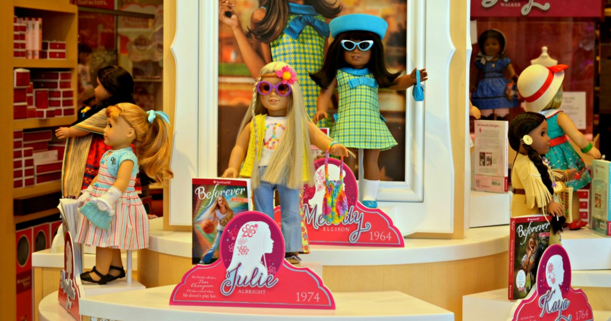 american girl dolls on display in a store