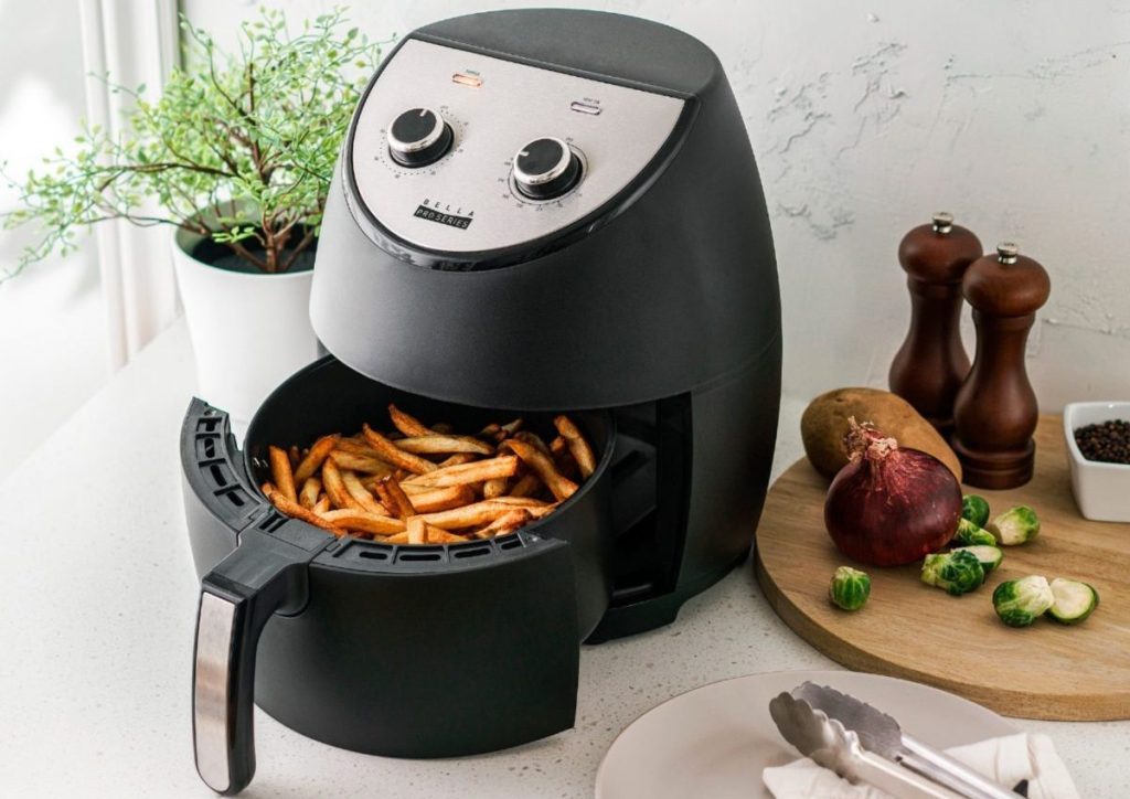 air fryer with fries in the basket