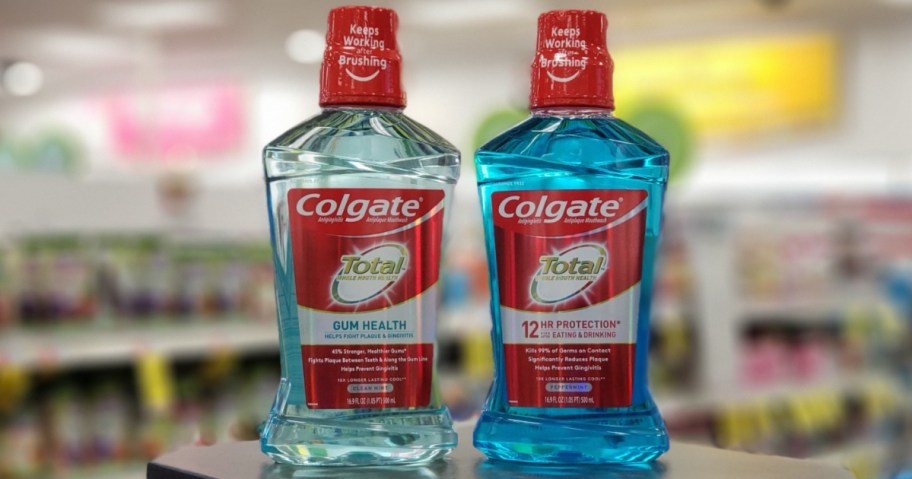 two bottles of Colgate total Mouthwash on shelf