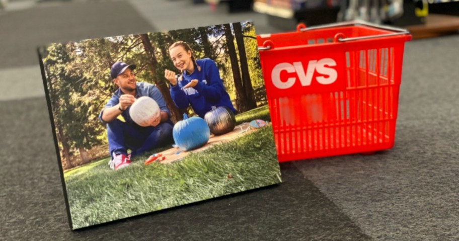 CVS photo canvas leaning against a CVS basket