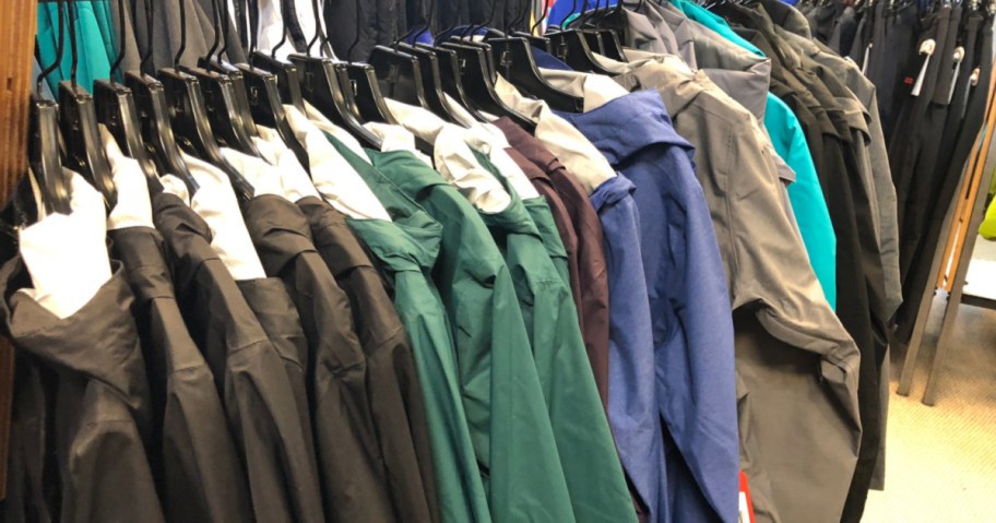 columbia jackets hanging on rack