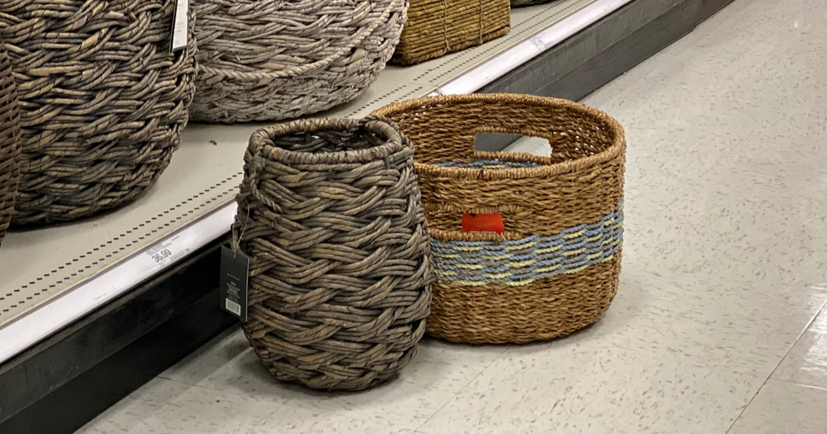 two decorative storage baskets on floor at target
