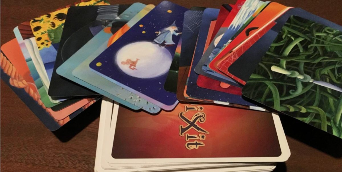 Dixit Board Game Cards fanned out on table