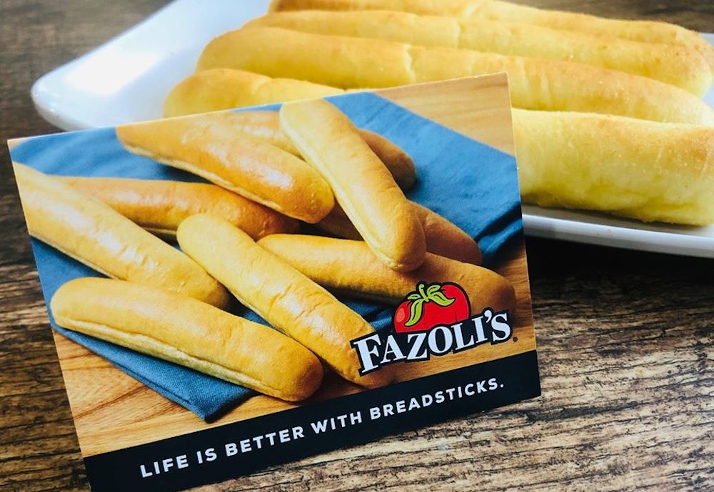 Fazoli's Gift Card by plate of breadsticks