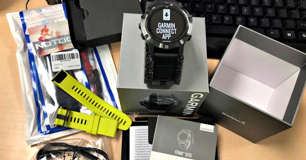 Garmin fēnix 5X Sapphire Smartwatch with contents of box