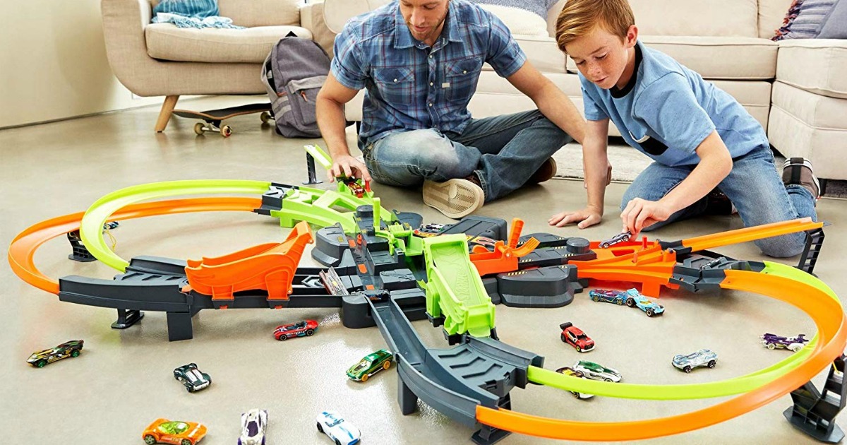people playing with the Hot Wheels Colossal Crash set