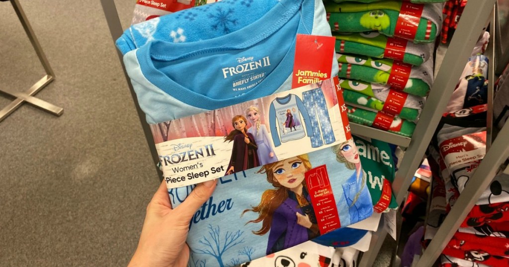 Woman holding a package of Kohl's Frozen Pajamas