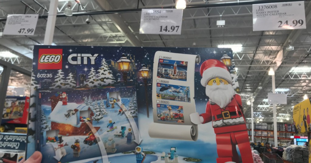 Lego City Advent Calendar at Costco being held up in front of price sign