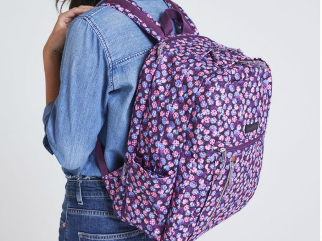 girl wearing Lighten Up Backpack