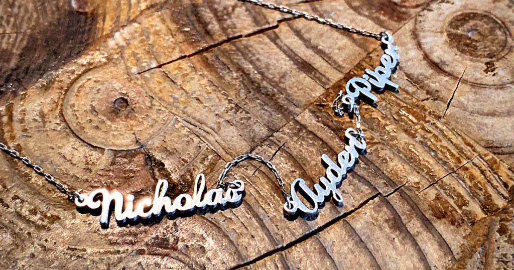 Mackenzie Treasury Dainty Name Necklace on wood table