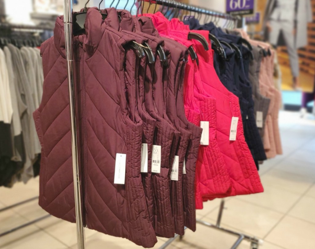 New York & Company Puffer Vests on rack in store in various colors