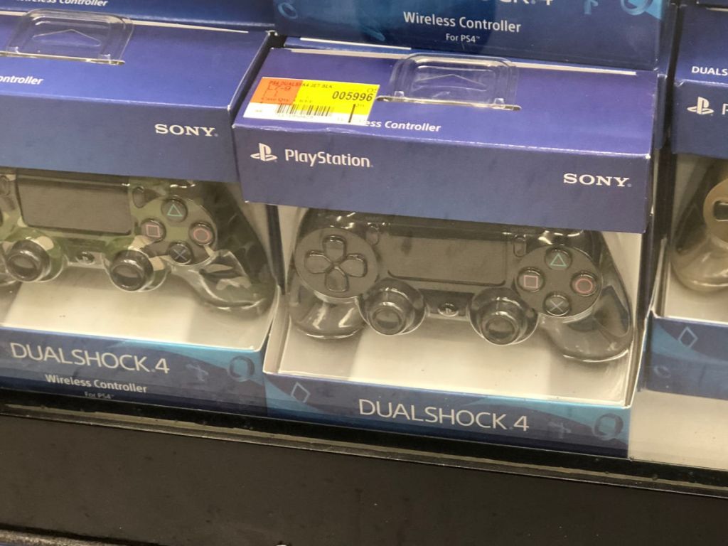 shelf of Playstation dual shock 4 controller in black