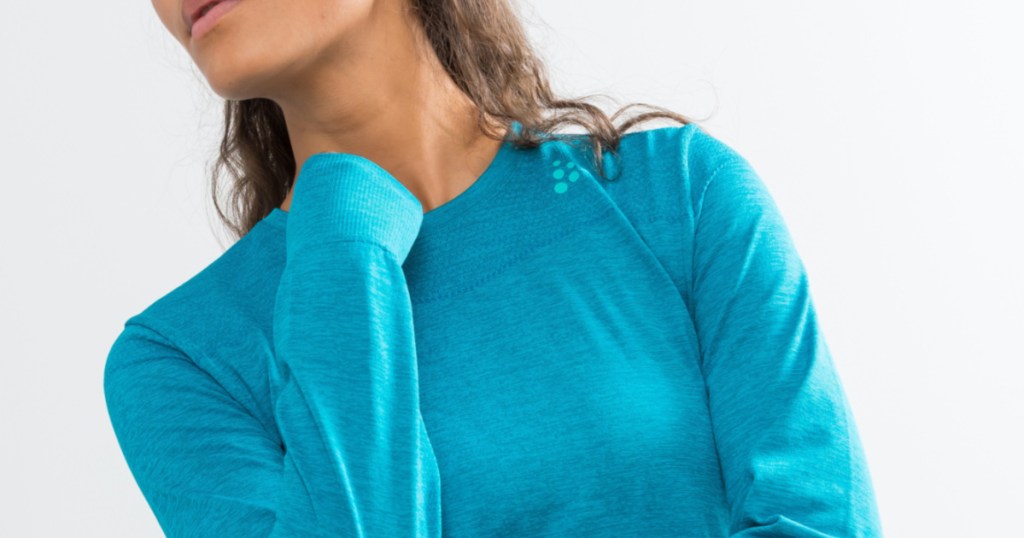 woman wearing blue baselayer shirt