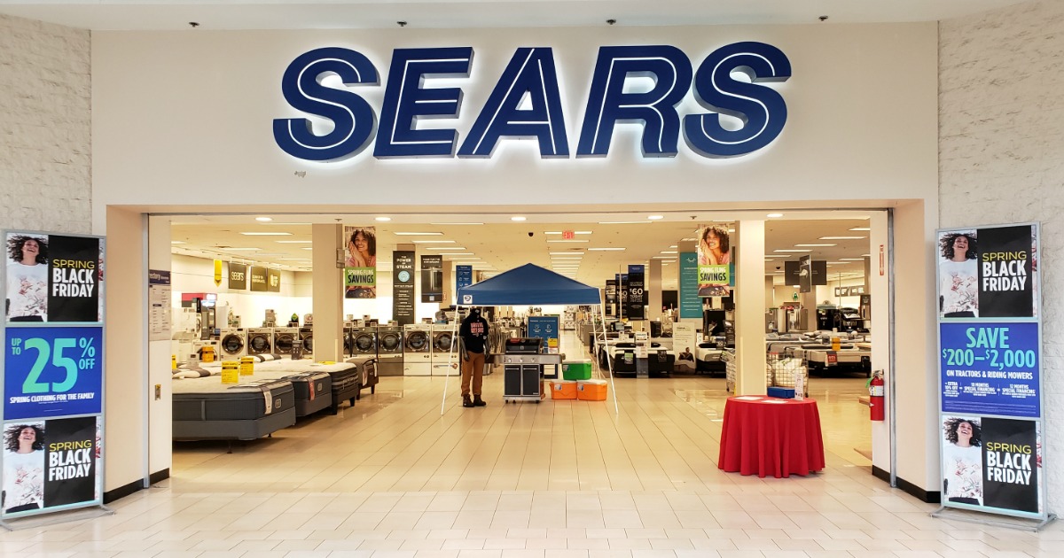 Sears storefront inside mall with Black Friday signage