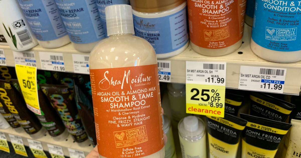 SheaMoisture shampoo in front of shelf 