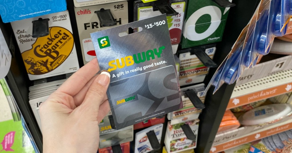 hand holding Subway Gift card