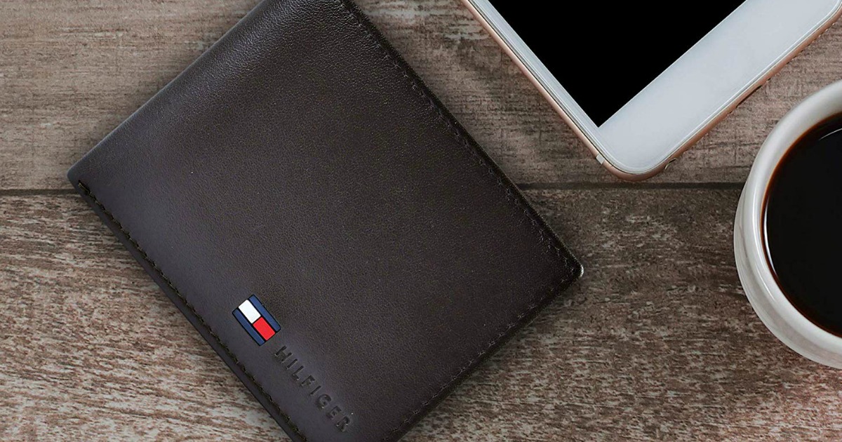 Tommy Hilfiger Wallet next to phone