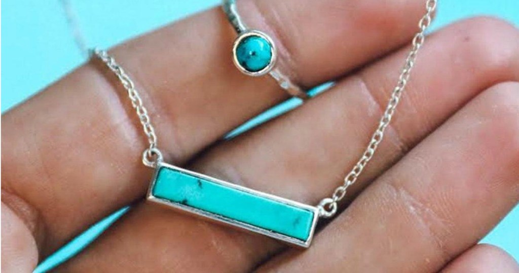 Woman holding Turquoise Bar Necklace