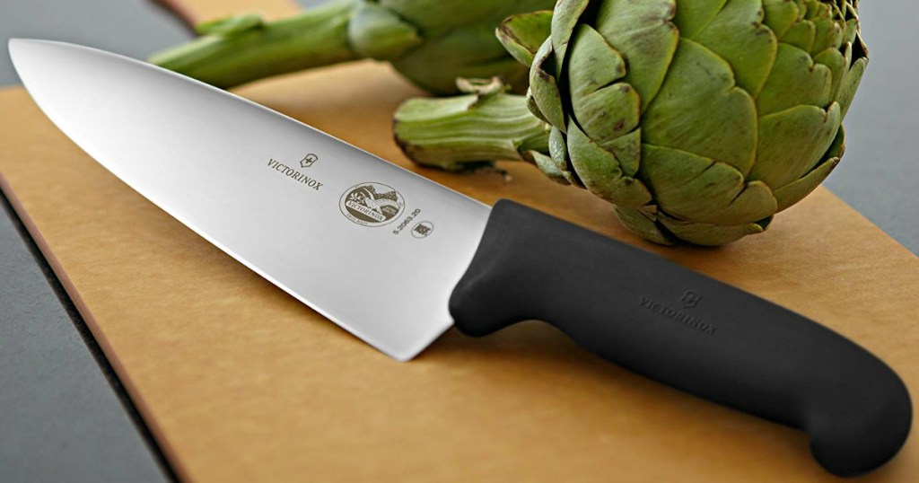Victorinox Fibrox Pro Chef's Knife on cutting board with artichoke