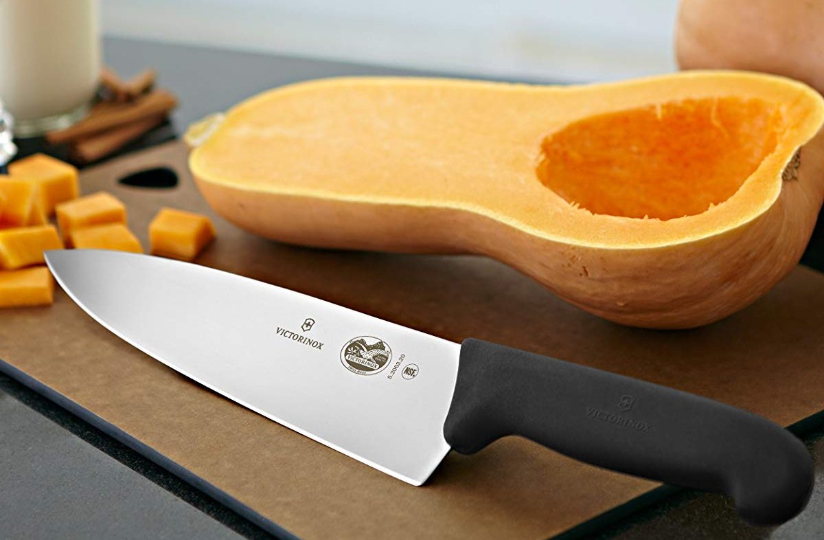 Victorinox Knife on cutting board with squash