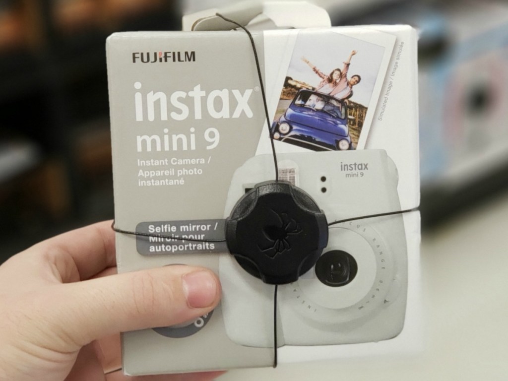 Fujifilm Instax Mini 9 Camera in hand in-store
