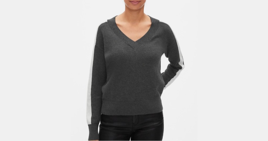woman wearing gray sweater
