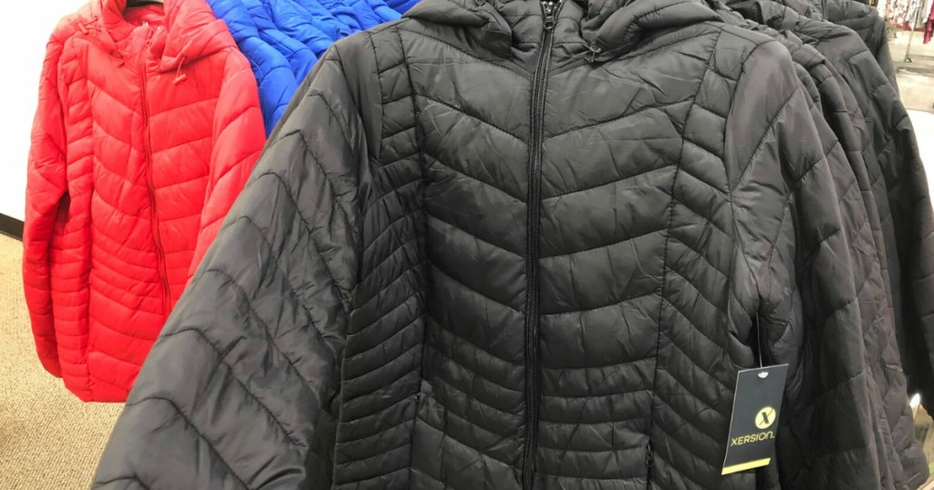 Women's puffer jacket on hanger on in-store rack at JCPenney